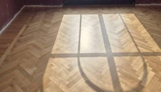 Posa parquet a spina a Brescia